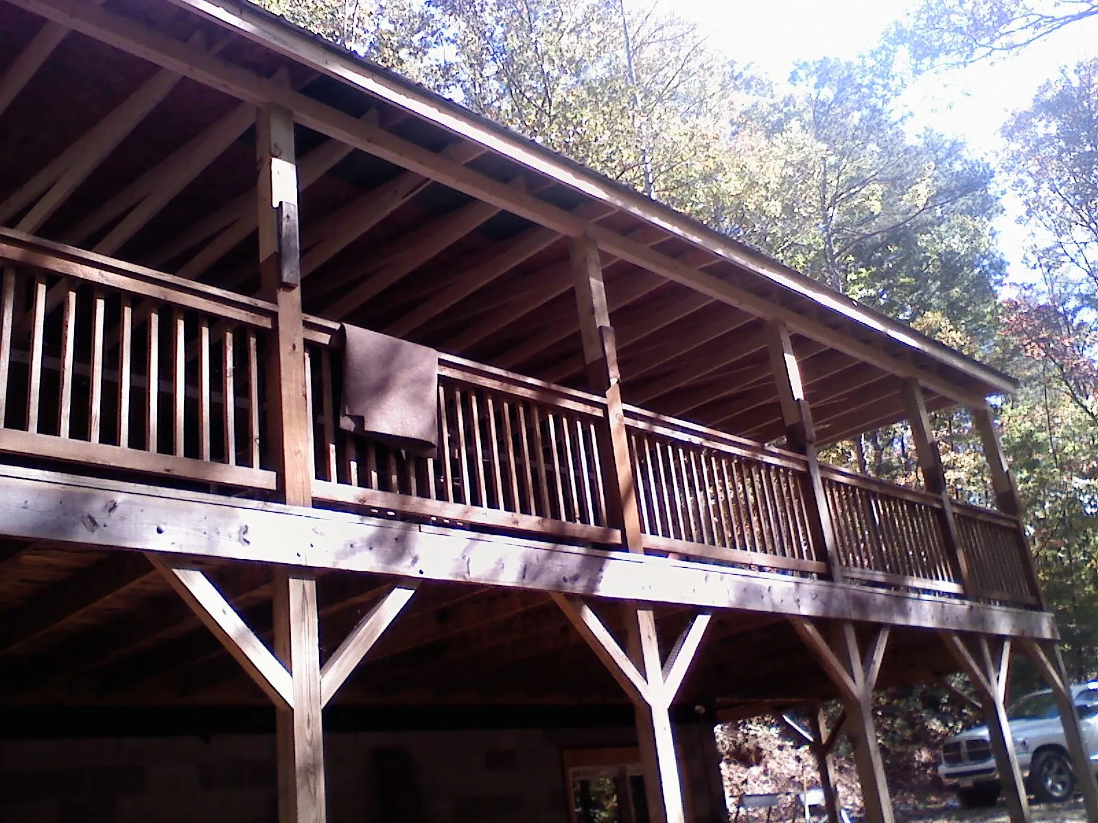Timber framing under a new elevated porch and deck — Roof Leak Repair in Shakopee by Roofing Brothers